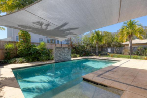 Spacious 4-Bed Home with Pool and Veranda